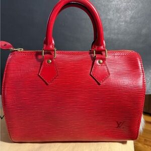 Louis Vuitton Speedy 25 Red Epi handbag with duster.